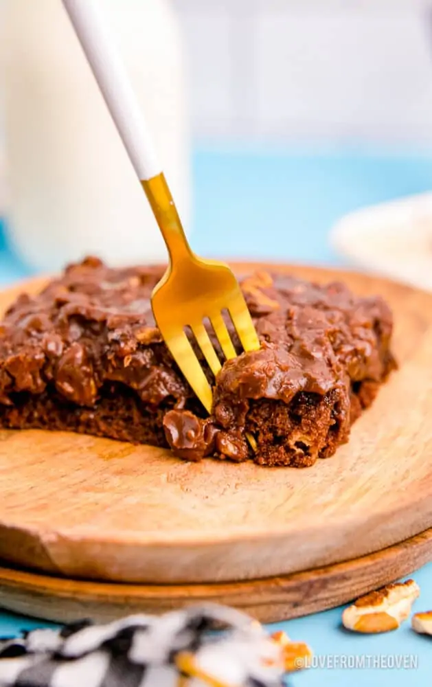 A fork taking a piece of Texas sheet cake