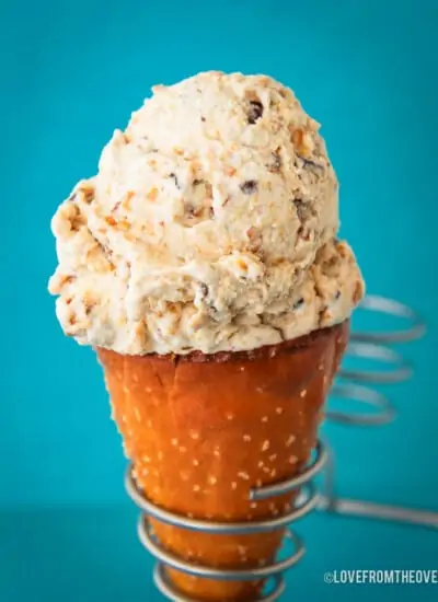 A photo of a peanut butter pretzel ice cream cone.