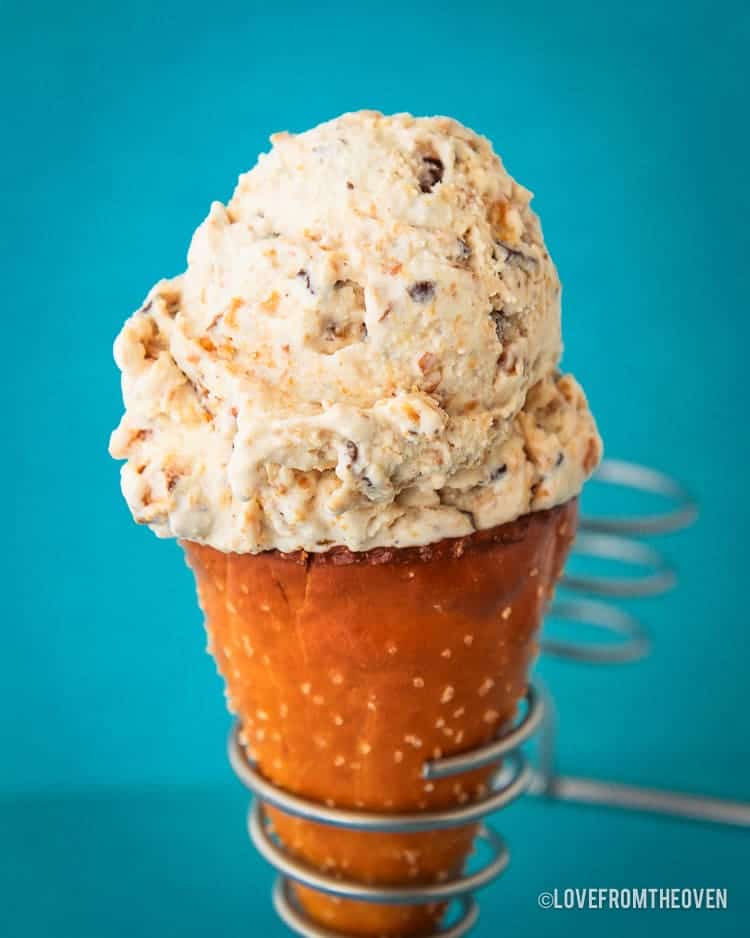 A photo of a peanut butter pretzel ice cream cone.