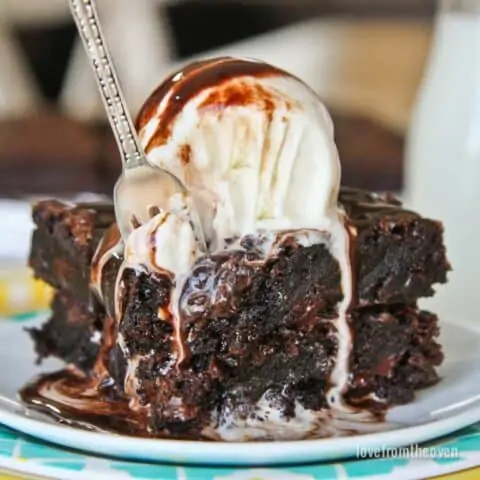 A brownie with ice cream on top.