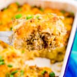 a tater tot breakfast casserole in a white and blue dish