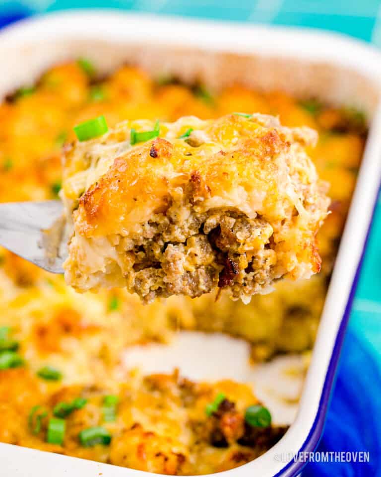 a tater tot breakfast casserole in a white and blue dish