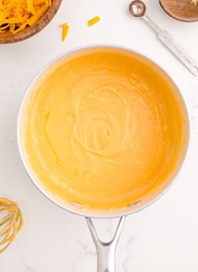 A pot of melted cheese.