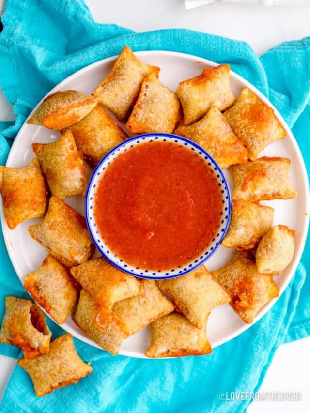 Pizza rolls that were made in an air fryer, on a plate.