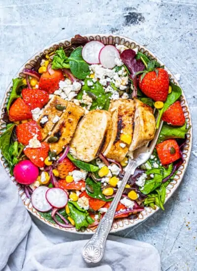 A bowl of strawberry chicken salad