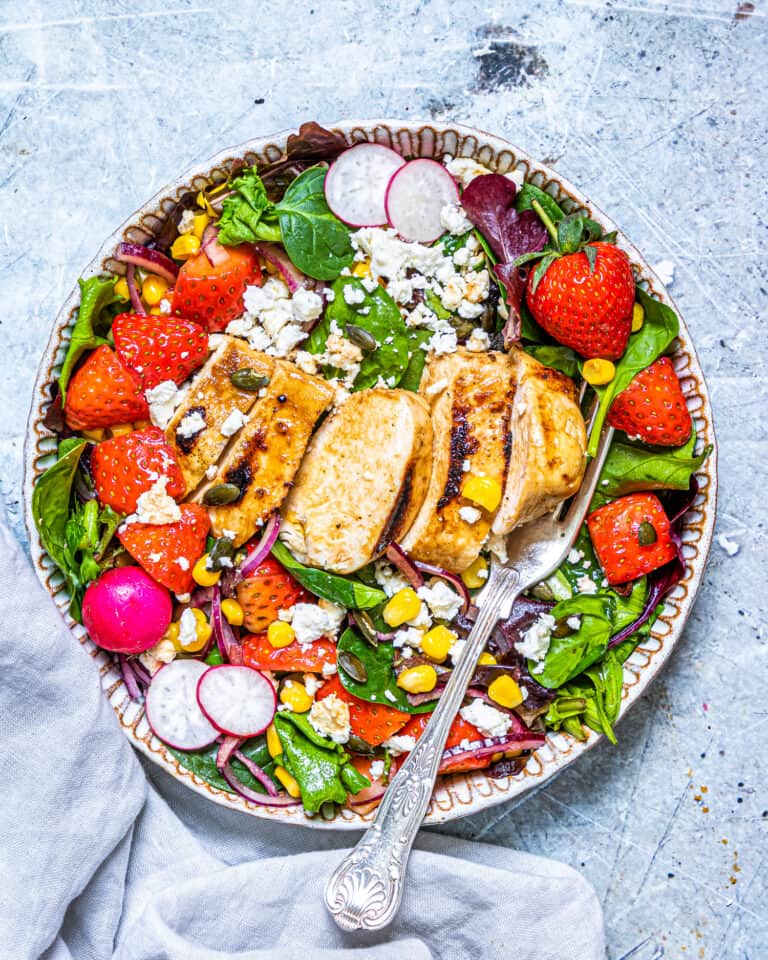 A bowl of strawberry chicken salad