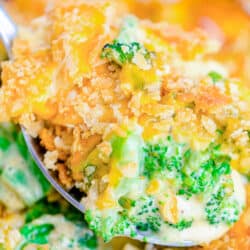 A close up of a broccoli casserole with ritz crackers