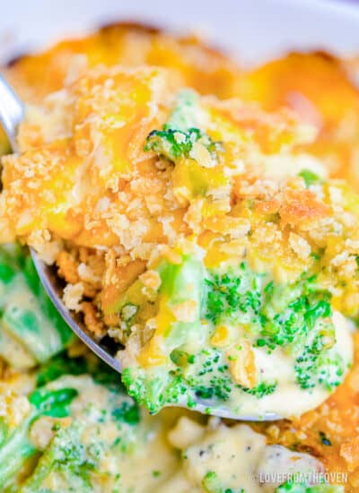 A close up of a broccoli casserole with ritz crackers