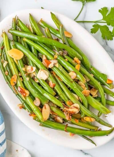 a plate of green beans almondine