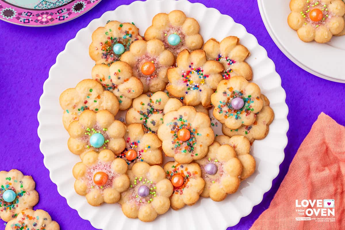 Spritz Cookies shaped like flowers on a plate
