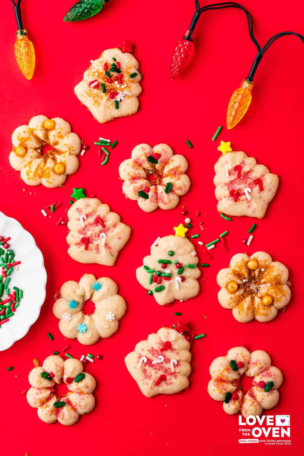 Spritz Cookies on a red background