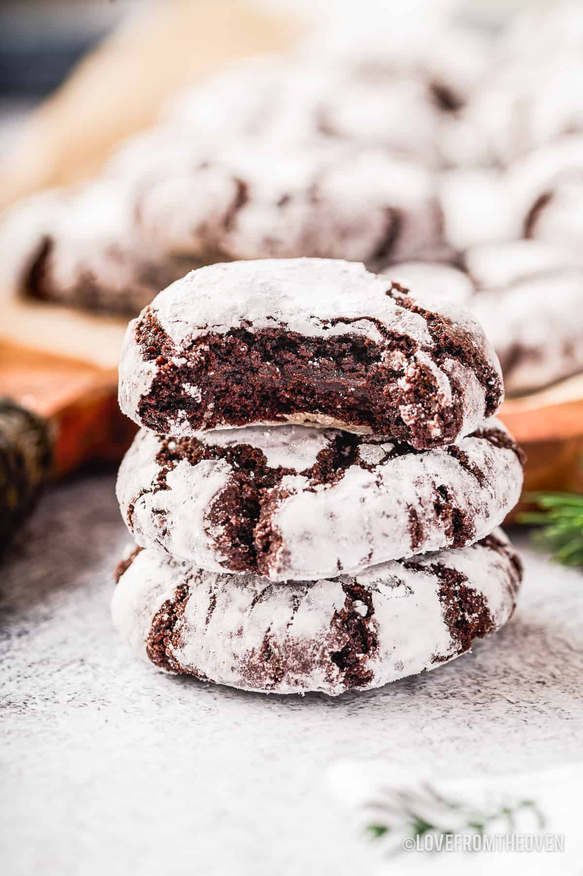 A stack of chocolate crinkle cookies