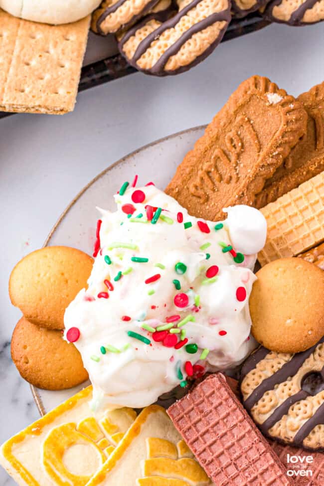 A plate of cookies with buddy the elf dessert dip
