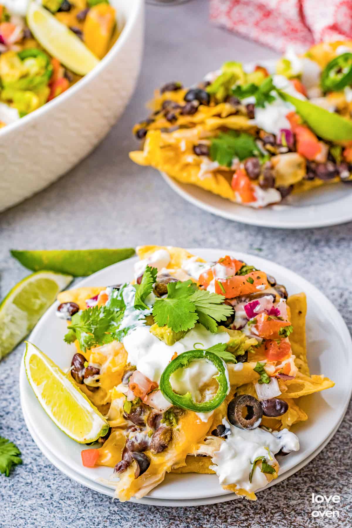 Plates of chicken nachos