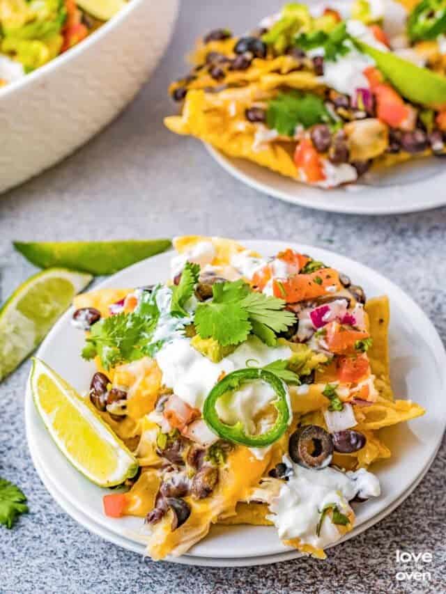Plates of chicken nachos