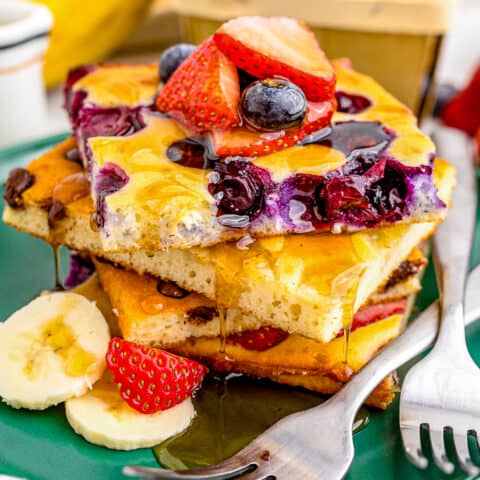 Sheet pan pancakes on a green plate.