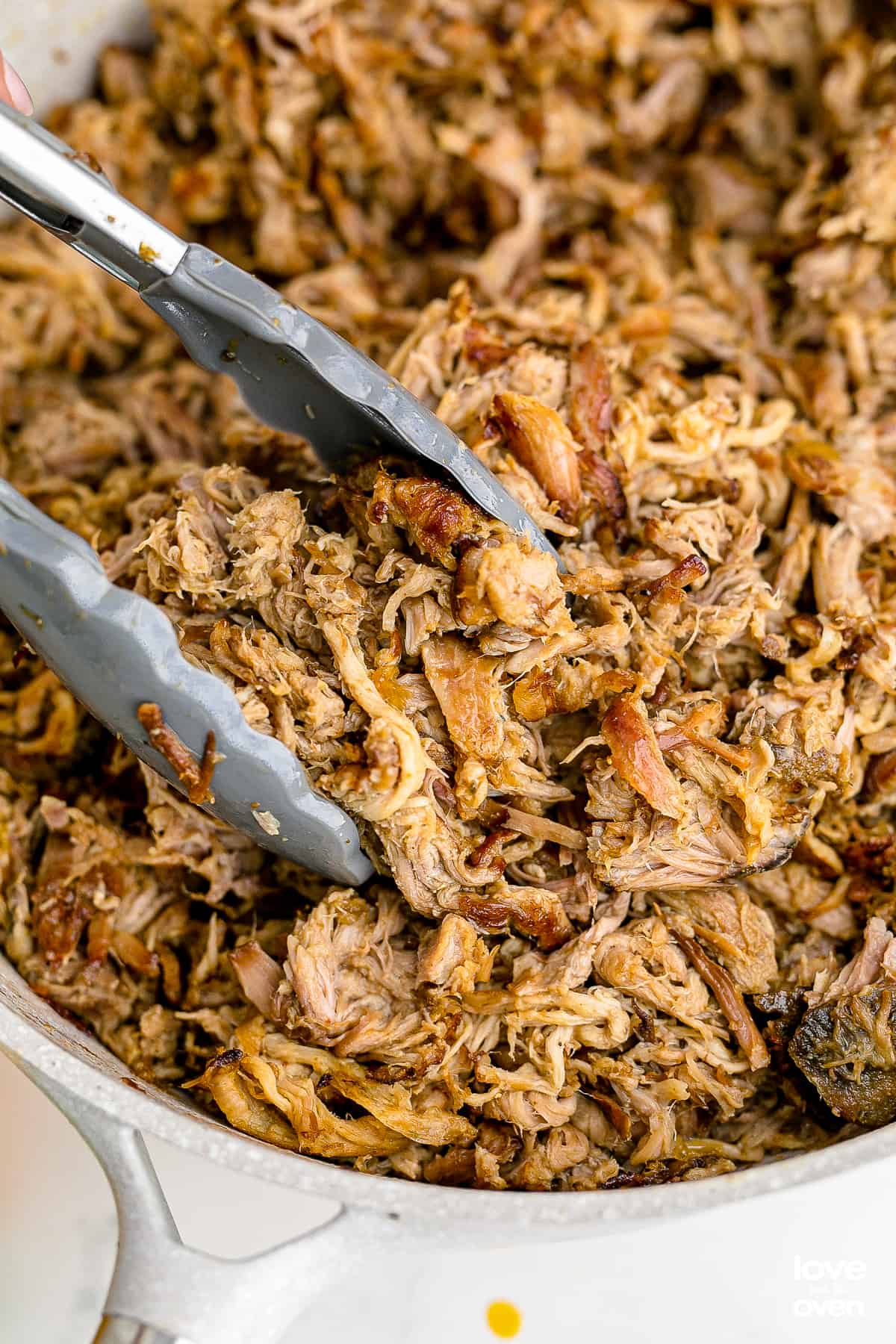 a pan full of pork carnita meat