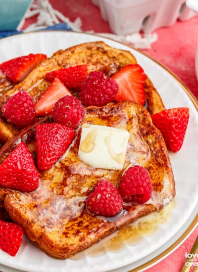 A plate of brioche french toast with berries