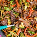 a close up photo of steak stir fry with broccoli