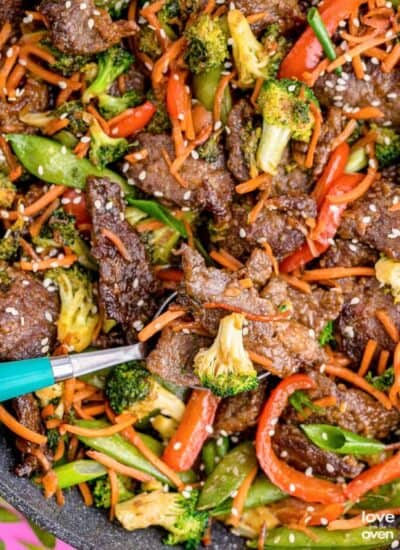 a close up photo of steak stir fry with broccoli