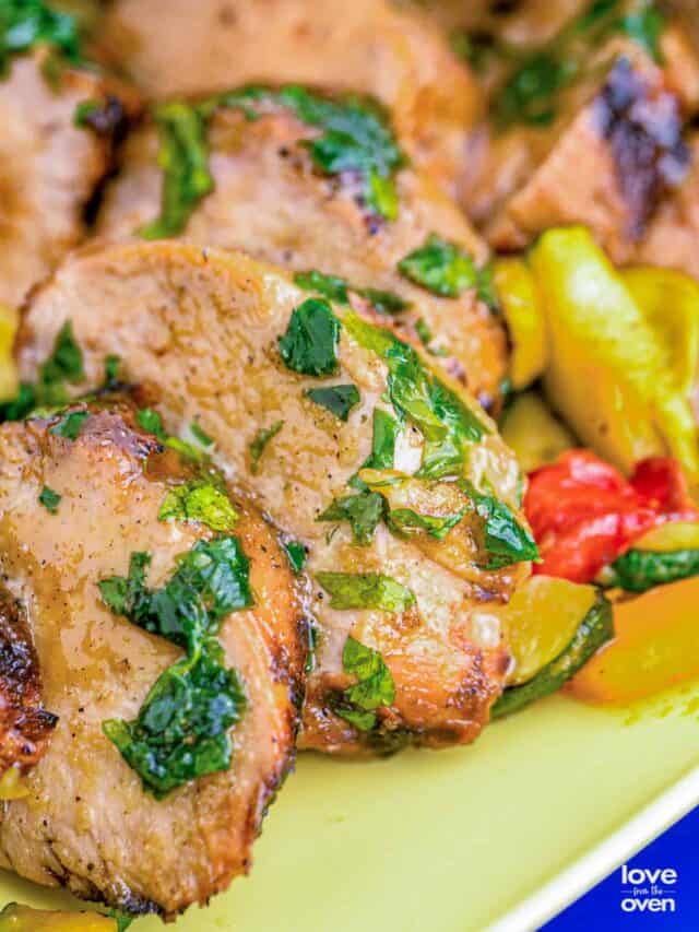 a few slices of grilled pork tenderloin covered in marinade