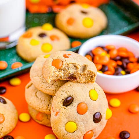 Reese's Pieces cookies on an orange background.