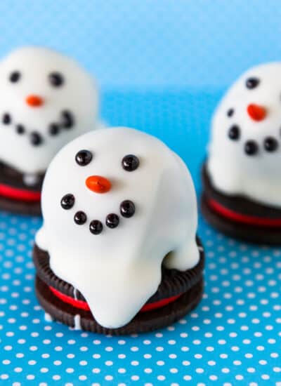 Oreo truffles that are made to look like snowmen.