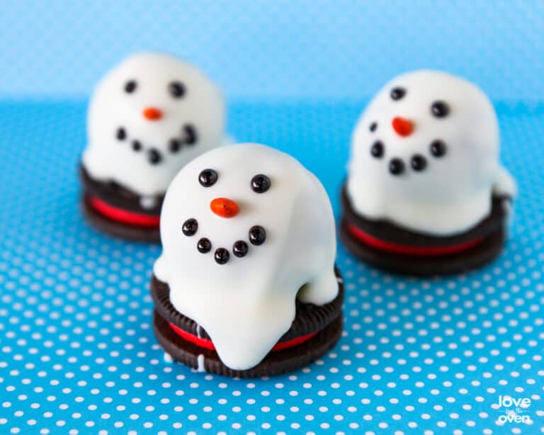 Oreo truffles that are made to look like snowmen.