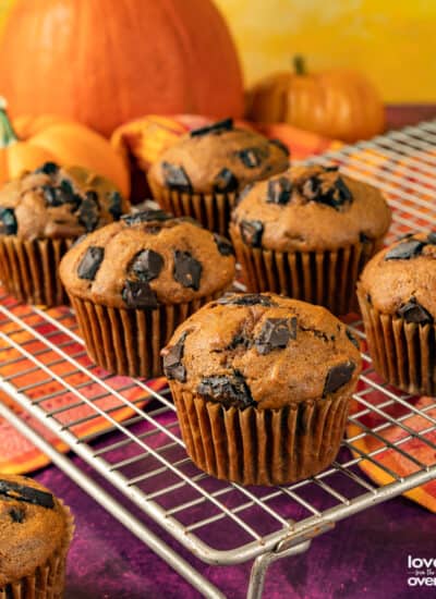 Pumpkin Chocolate Chip Muffins on a wire cooling rack.