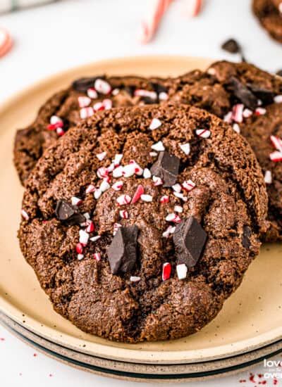 a few chocolate peppermint cookies on a tan plate