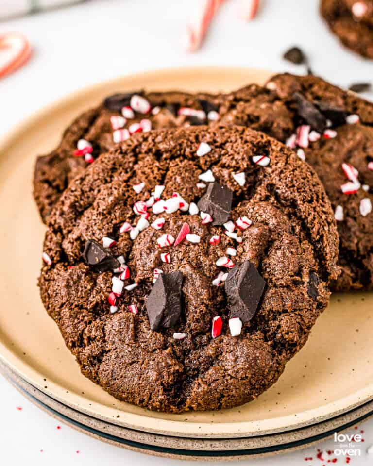 a few chocolate peppermint cookies on a tan plate