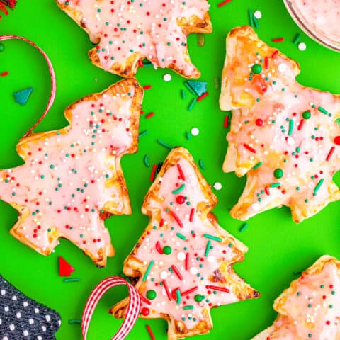 Christmas hand pies on a green background