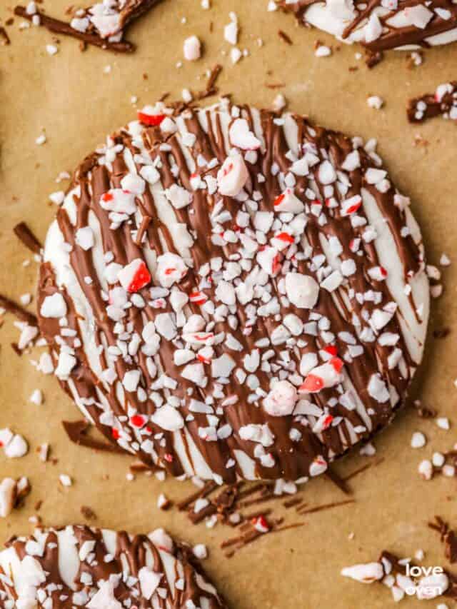 A hot chocolate marshmallow topper on brown paper.