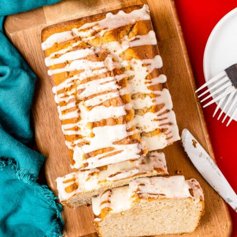 An overhead shot of eggnog bread on a cutting board.