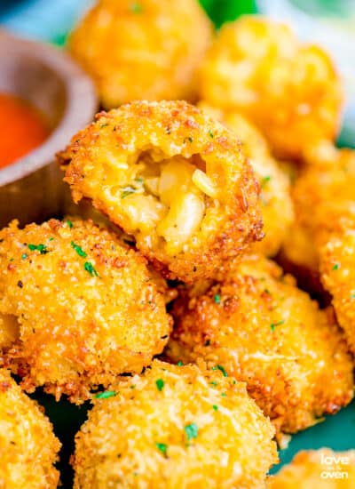 A plate of mac and cheese bites.