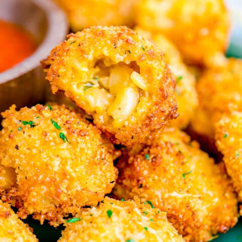 A plate of mac and cheese bites.