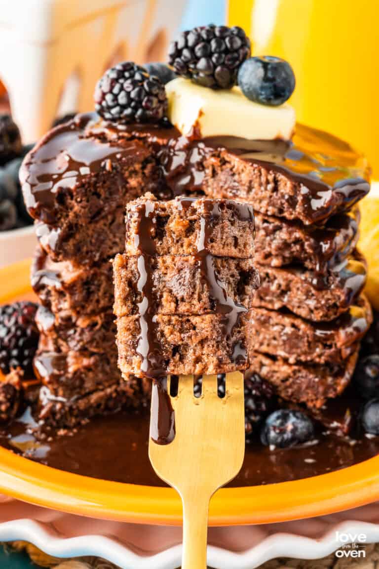 Chocolate pancakes on a gold fork.