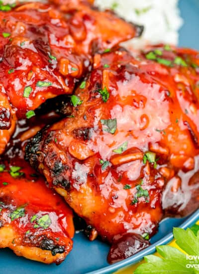 A close up of cranberry chicken on a plate.