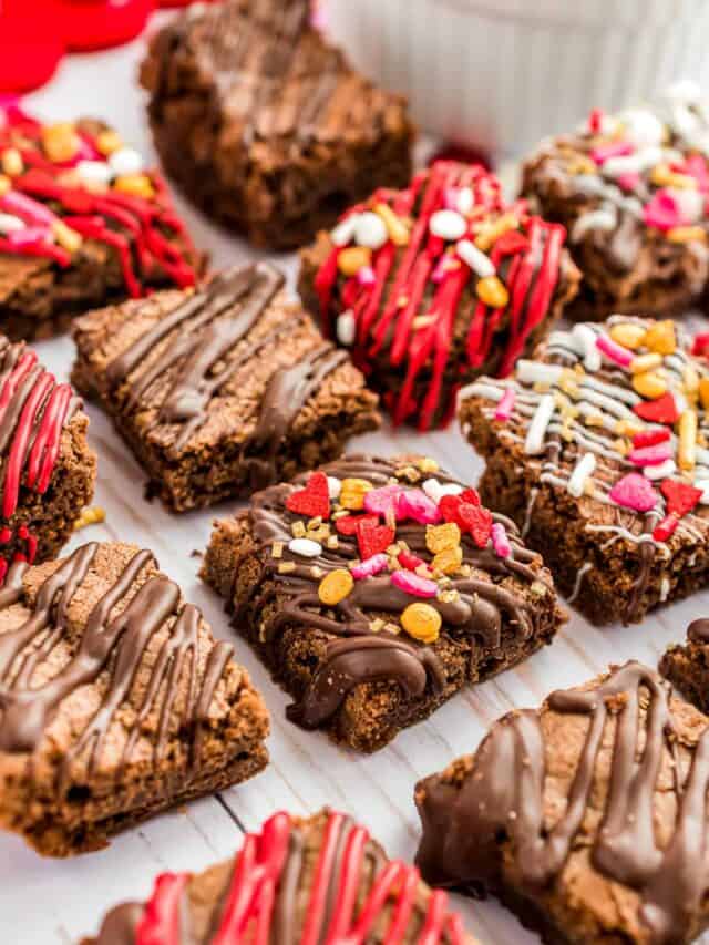 decorated valentine brownie bites on a white background