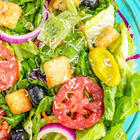 A close up photo of an olive garden copycat salad.