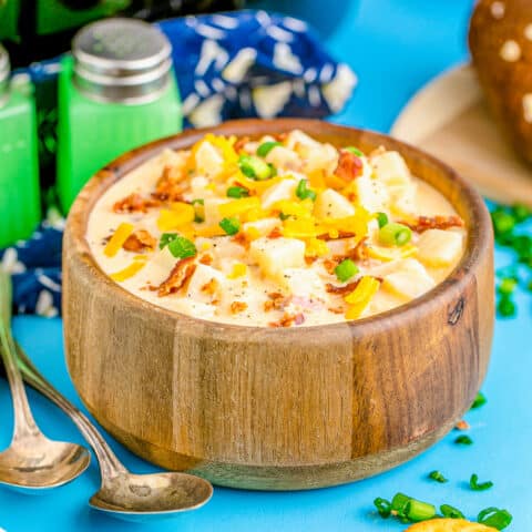 crockpot potato soup in a wooden bowl