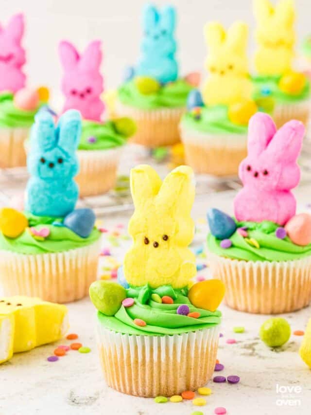 peeps cupcakes on a decorated table