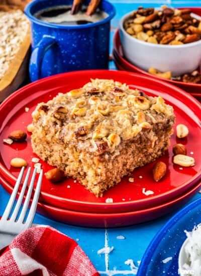 a slice of oatmeal cake on a red plate