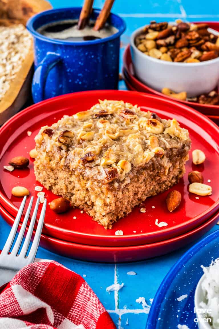 a slice of oatmeal cake on a red plate