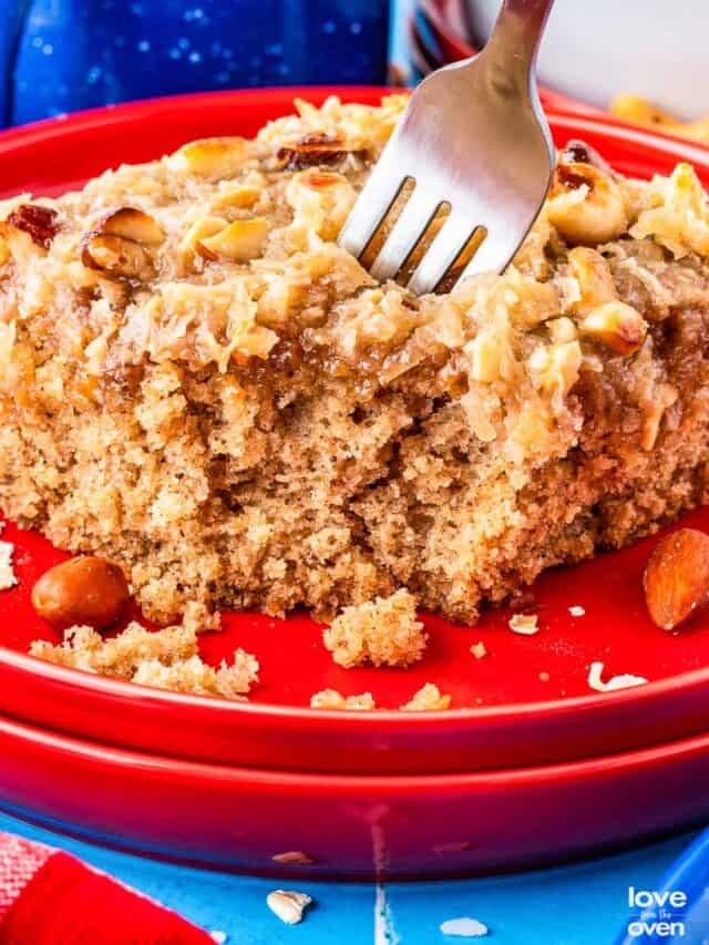a fork digging into a slice of oatmeal cake
