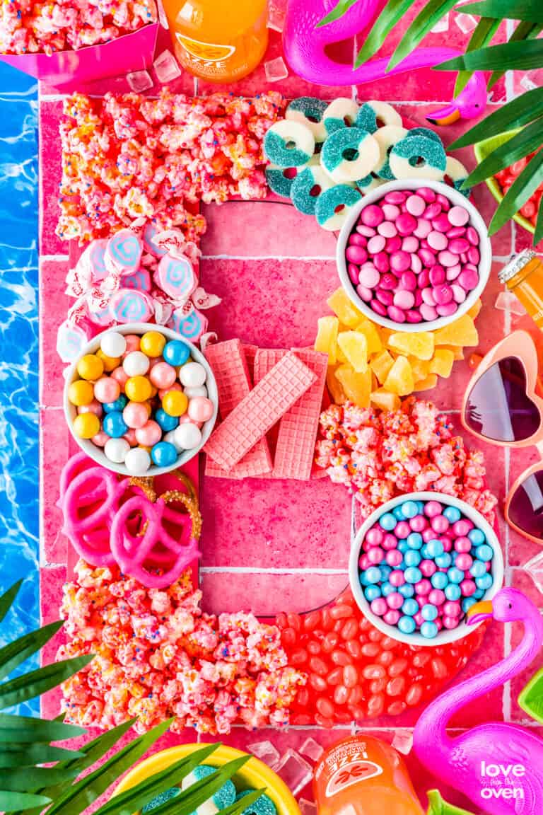 a barbie themed snack board