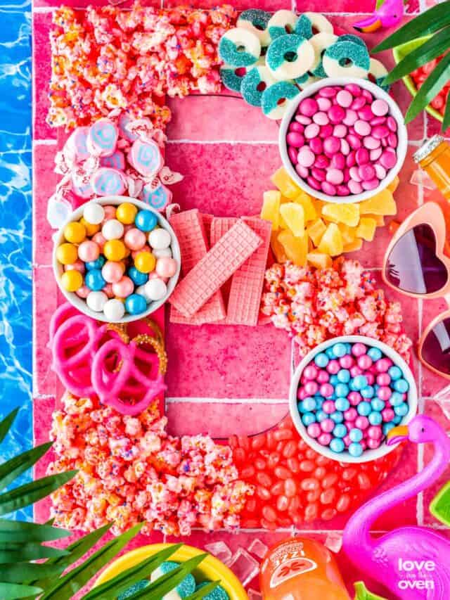 a barbie themed snack board
