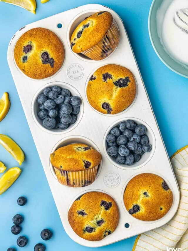 lemon blueberry muffins in a muffin pan