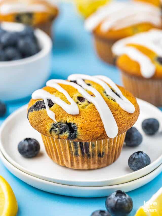 a lemon blueberry muffin on a white plate