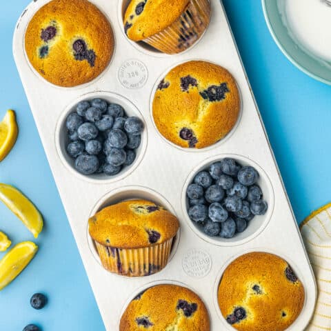 lemon blueberry muffins in a muffin pan
